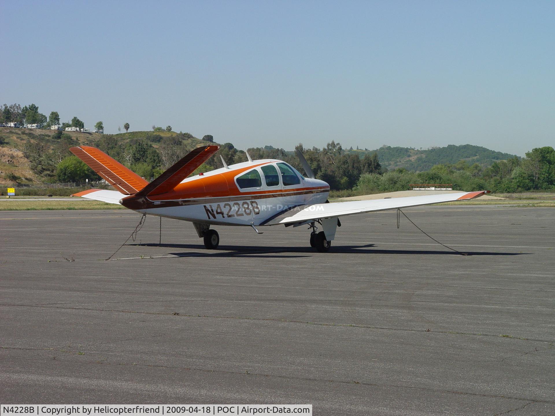 N4228B, 1955 Beech F35 Bonanza C/N D-4197, Parked, tied down and waiting