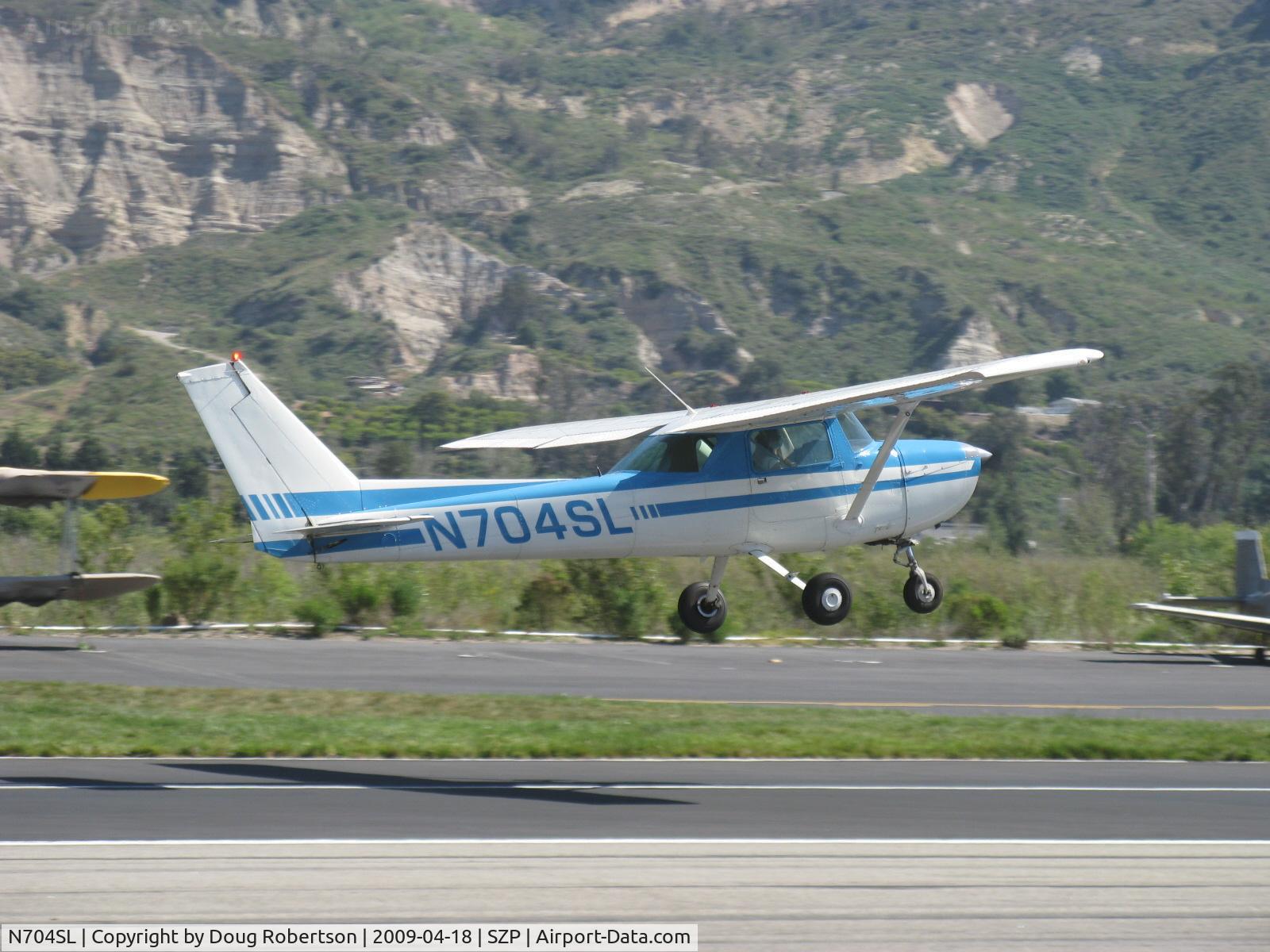 N704SL, 1976 Cessna 150M C/N 15078837, 1976 Cessna 150M, Continental O-200 100 Hp, takeoff climb Rwy 22