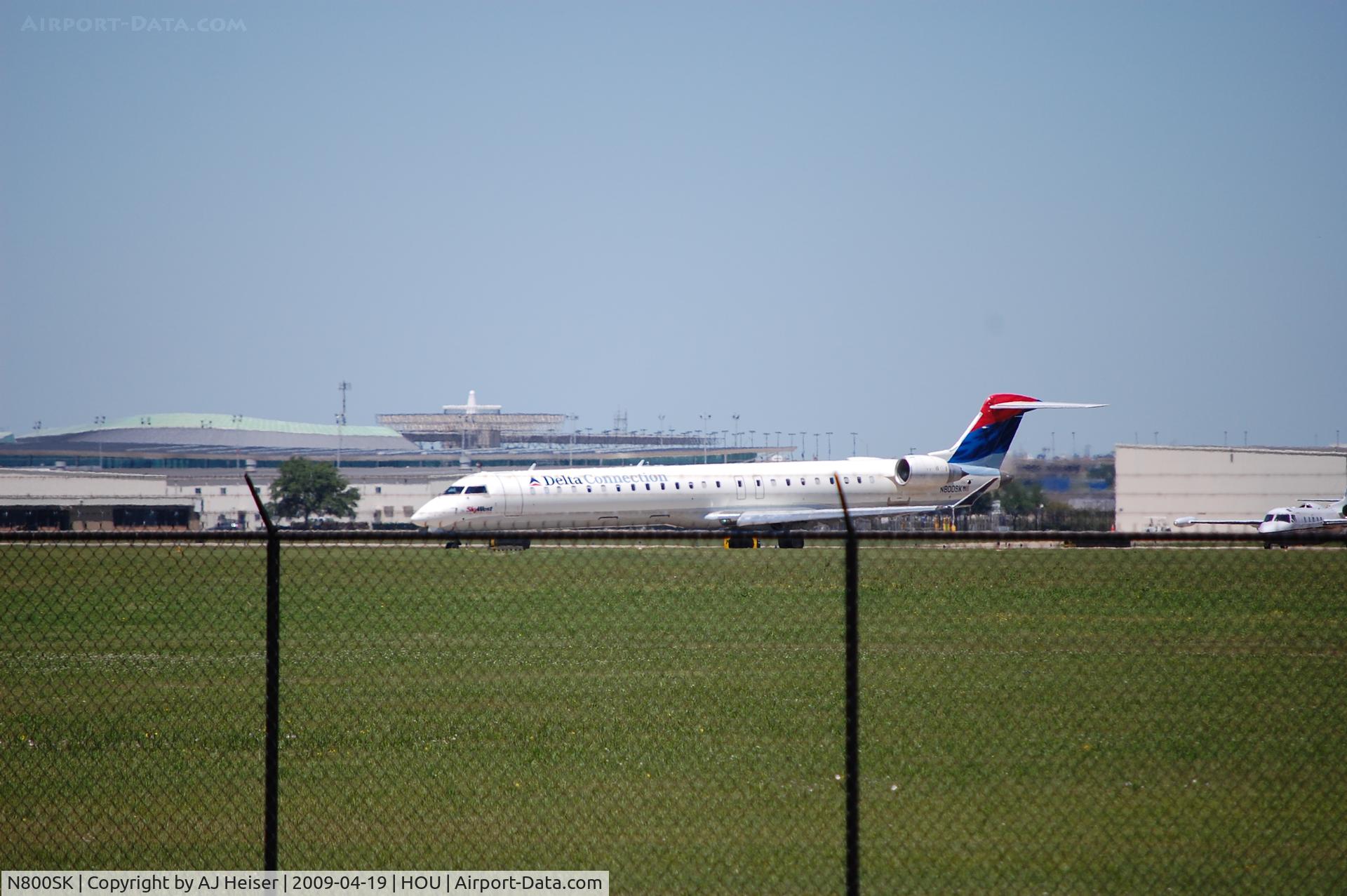 N800SK, 2006 Bombardier CRJ-900ER (CL-600-2D24) C/N 15060, N800SK holding short rwy 30L at KHOU