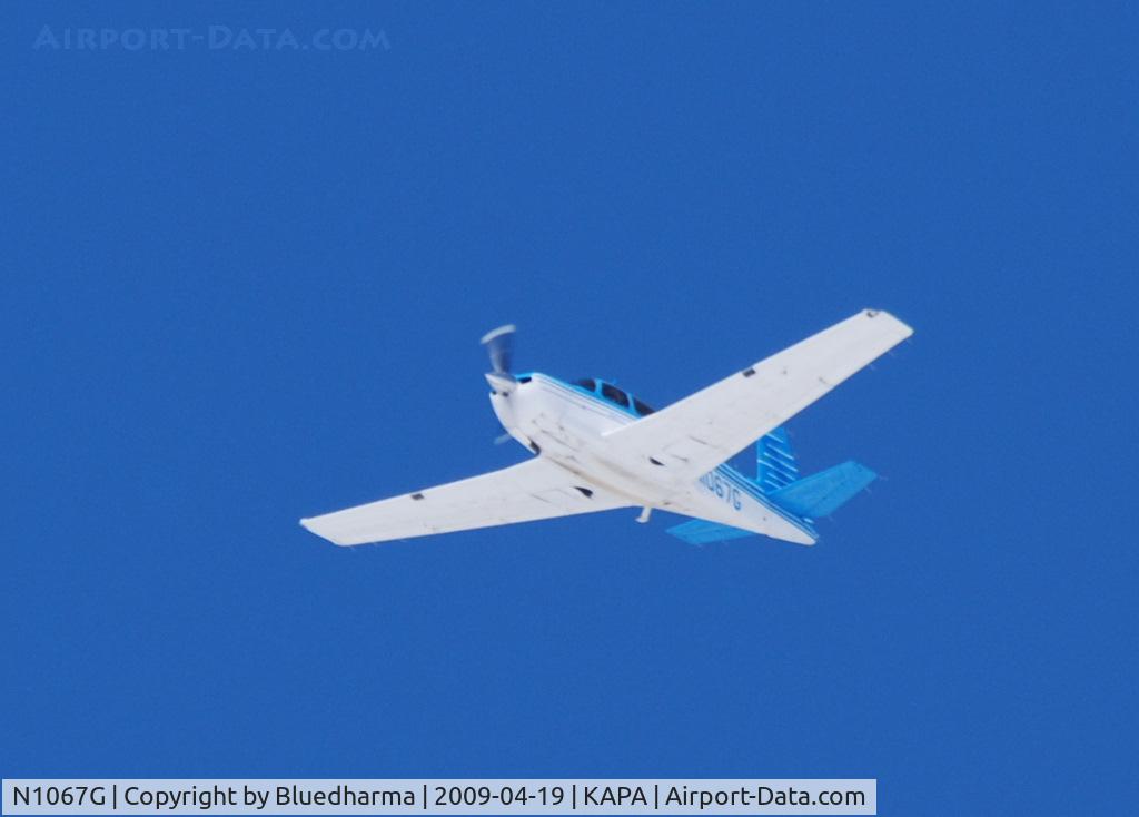 N1067G, 1990 Mooney M20J 201 C/N 24-3174, Flying over APA.