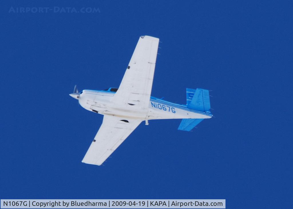 N1067G, 1990 Mooney M20J 201 C/N 24-3174, Flying over APA.