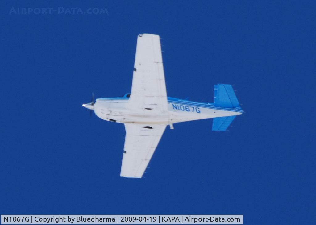 N1067G, 1990 Mooney M20J 201 C/N 24-3174, Flying over APA.