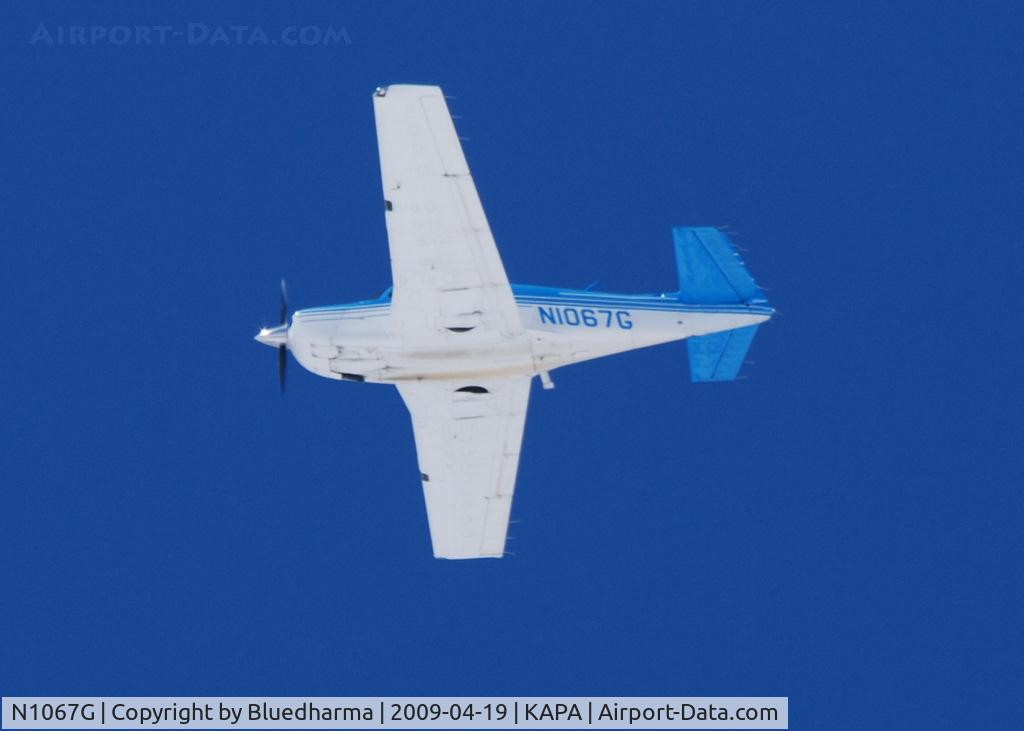 N1067G, 1990 Mooney M20J 201 C/N 24-3174, Flying over APA.