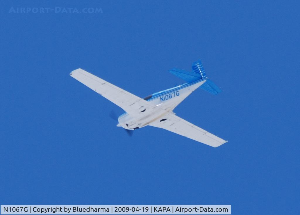 N1067G, 1990 Mooney M20J 201 C/N 24-3174, Flying over APA.