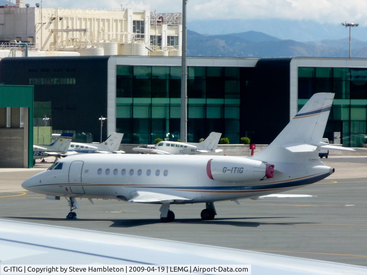 G-ITIG, 2006 Dassault Falcon 2000EX C/N 102, Taken out of the pristine, new window of G-EZTC, whilst taxiing out for take off.
