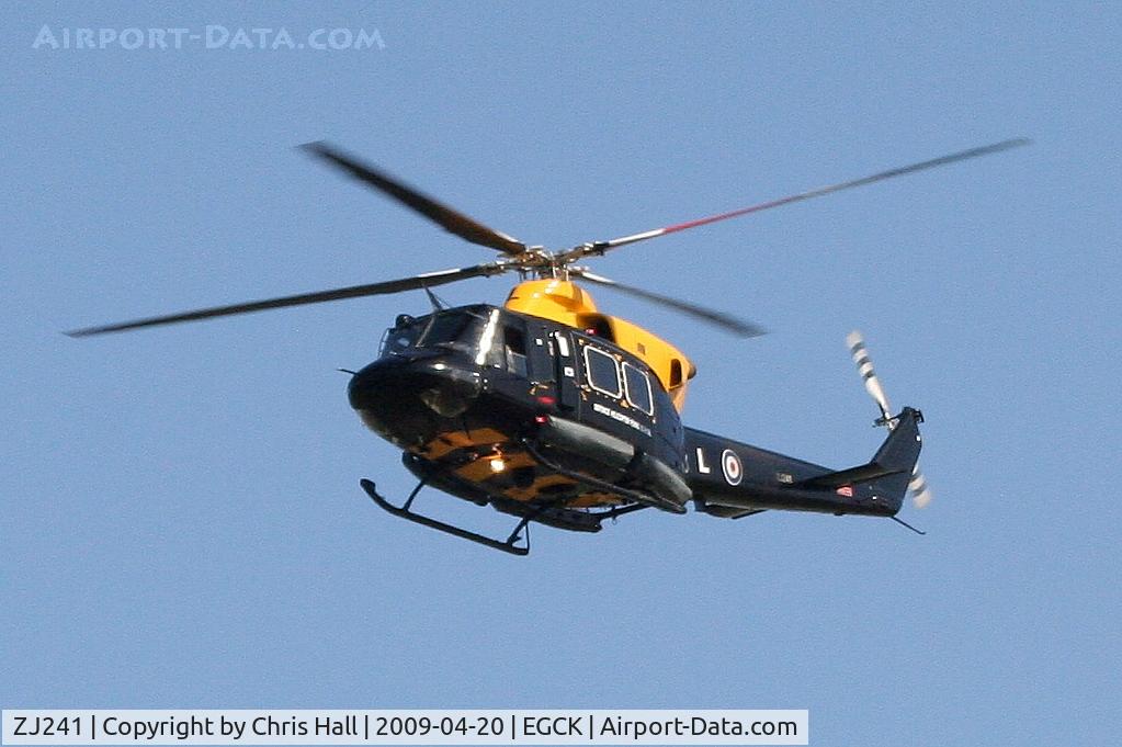 ZJ241, 1997 Bell 412EP Griffin HT1 C/N 36164, performing circuits at Caernarfon Airport