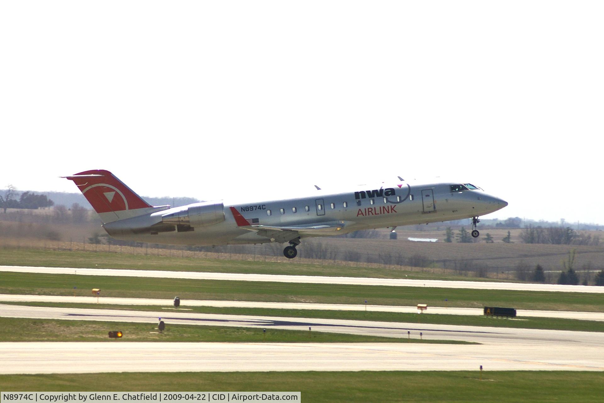 N8974C, 2004 Canadair CRJ-200LR (CL-600-2B19) C/N 7974, Departing Runway 31