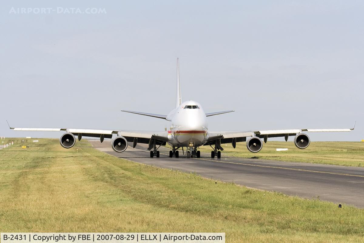 B-2431, 2000 Boeing 747-409F/SCD C/N 30761, Yangtse River Express taxies to the holding point at ELLX