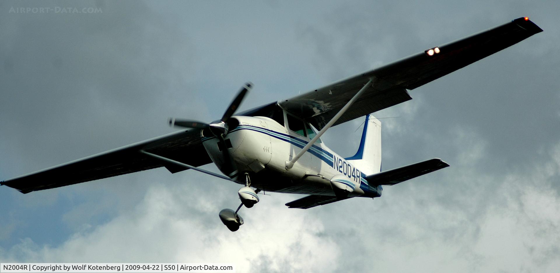 N2004R, 1963 Cessna 182G Skylane C/N 18255204, seconds from touch down at Auburn regional