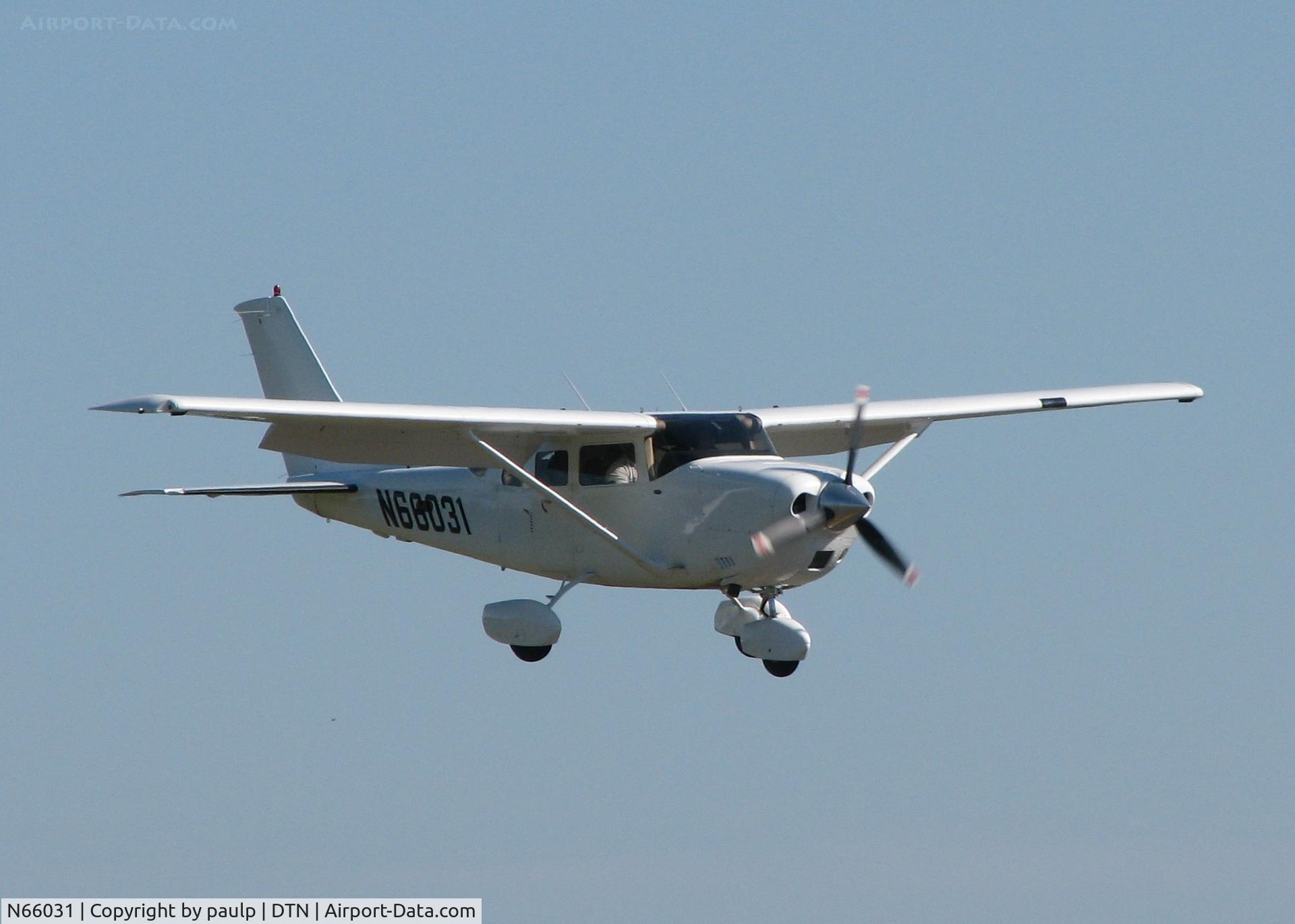 N66031, 2005 Cessna T206H Turbo Stationair C/N T20608512, Landing on 14 at the Shreveport Downtown airport.
