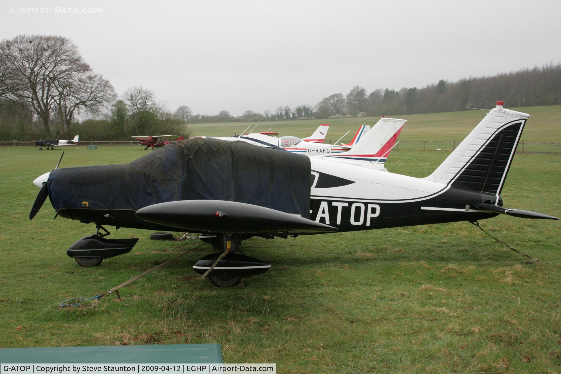 G-ATOP, 1966 Piper PA-28-140 Cherokee C/N 28-21682, Taken at Popham Airfield, England on a gloomy April Sunday (12/04/09)