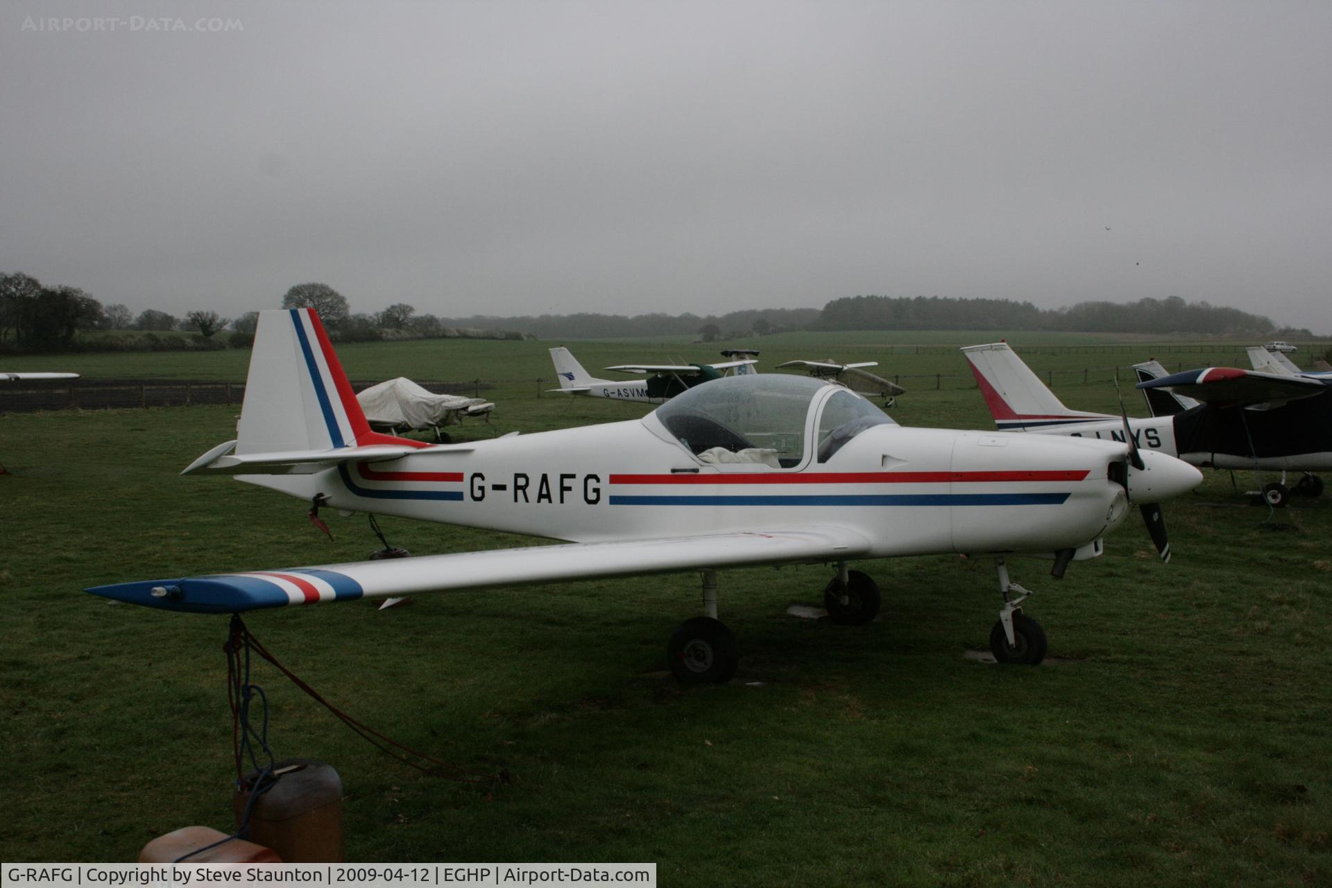 G-RAFG, 1989 Slingsby T-67C Firefly C/N 2076, Taken at Popham Airfield, England on a gloomy April Sunday (12/04/09)