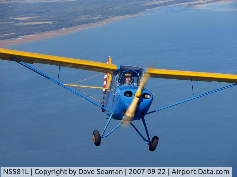 N5581L, Aeronca 7AC Champion C/N 7AC-6231, In flight over Saginaw Bay