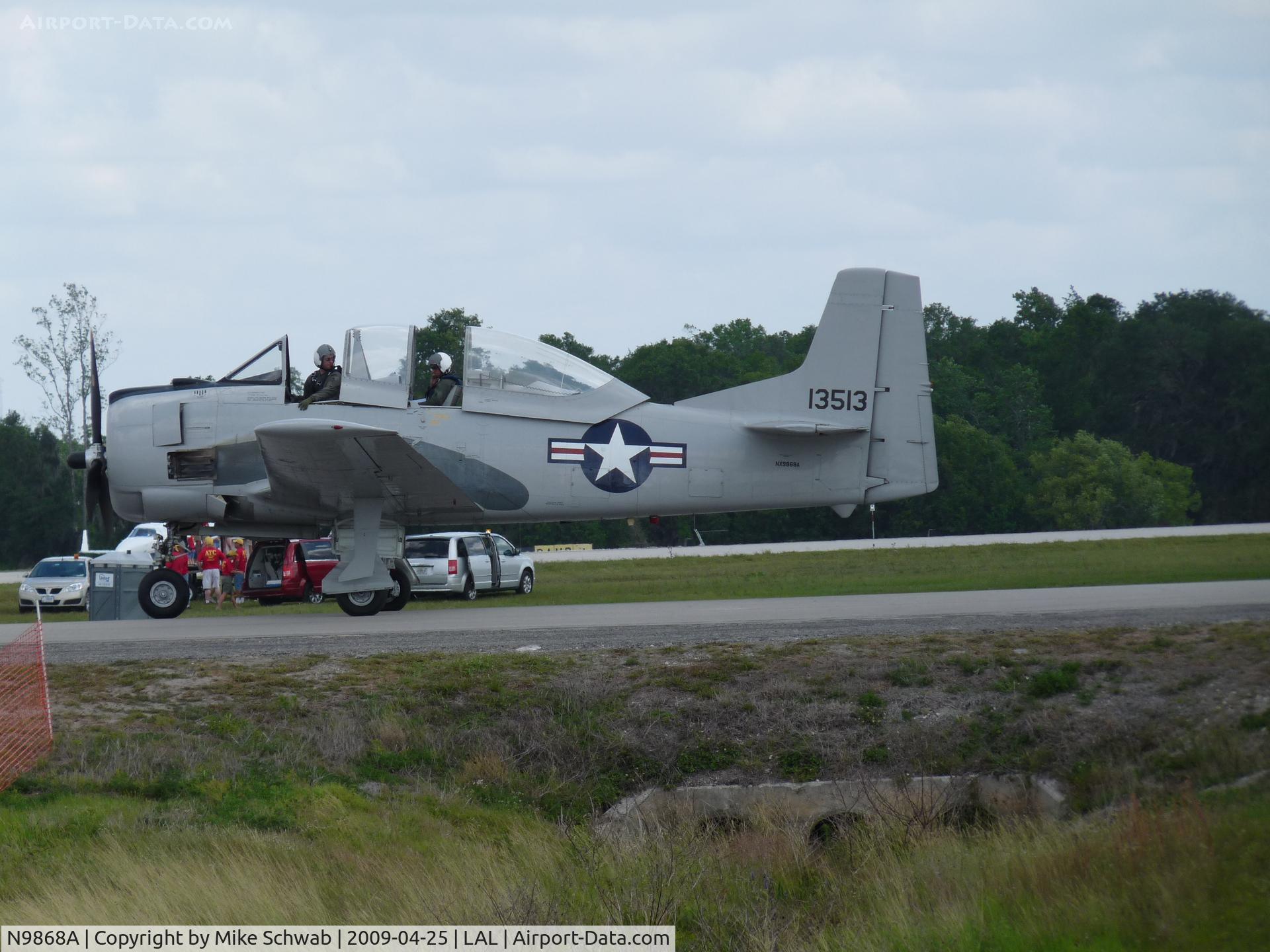 N9868A, 1951 North American T-28D Trojan C/N 174-51 (51-3513), Taxing at Sun-N-Fun