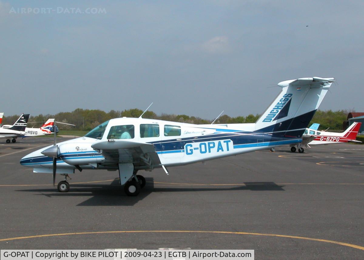 G-OPAT, 1979 Beech 76 Duchess C/N ME-304, TAXYING PAST THE CAR PARK