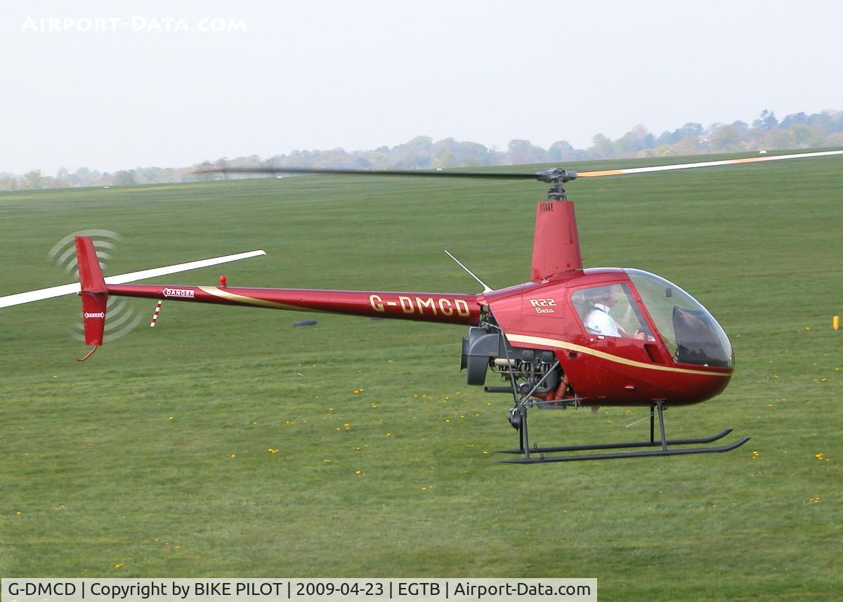 G-DMCD, 1989 Robinson R22 Beta C/N 1201, FLYING PAST THE AIRFIELD RESTAURANT