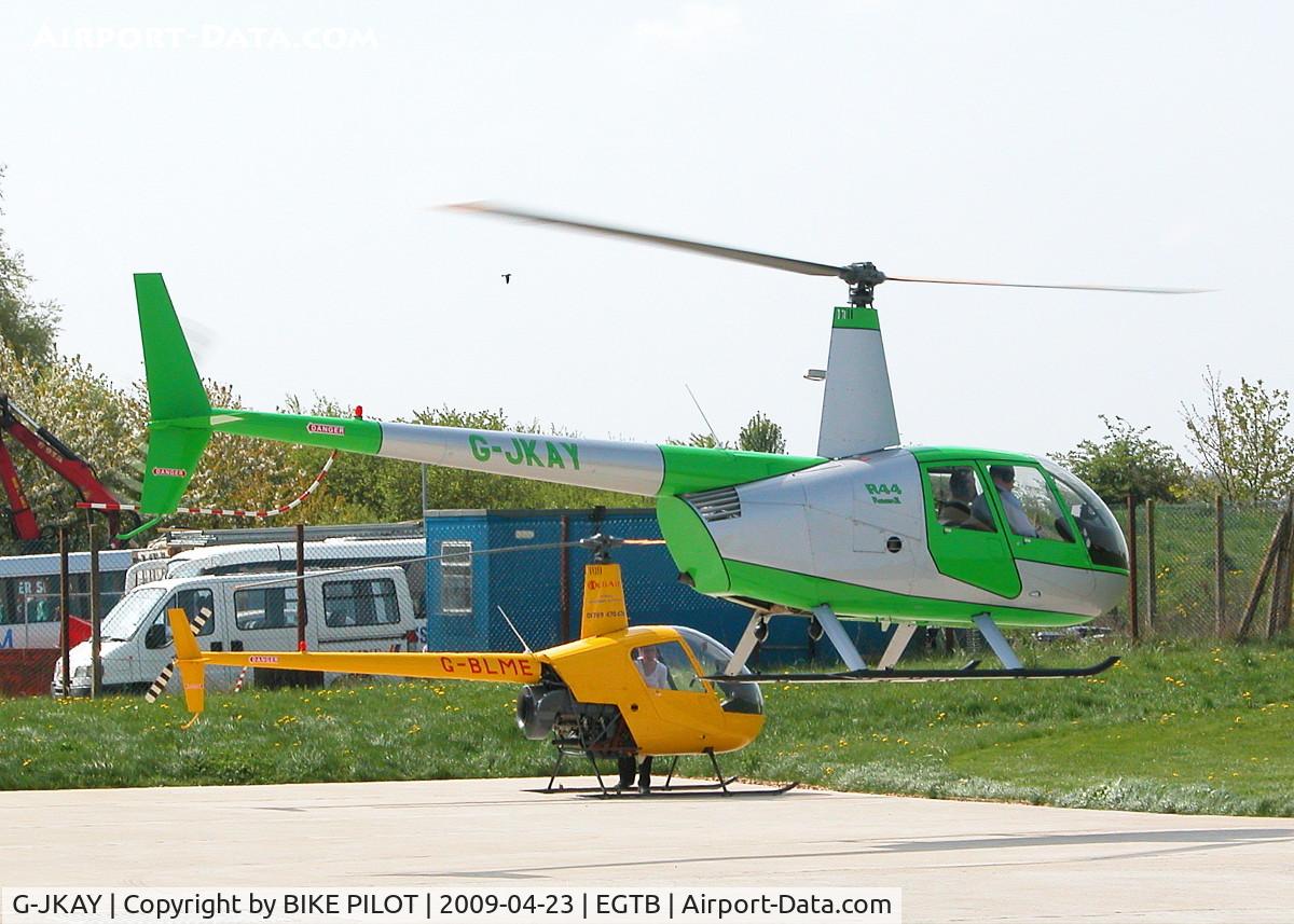 G-JKAY, 2006 Robinson R44 Raven II C/N 11093, LEAVING THE HELI AIR APRON