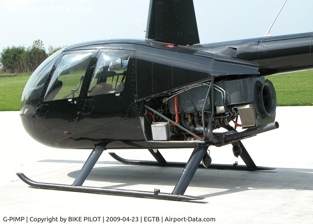 G-PIMP, 2008 Robinson R44 Raven II C/N 12123, MIKE PAPA ON THE HELI AIR APRON WITH THE ENGINE COWLINGS OF