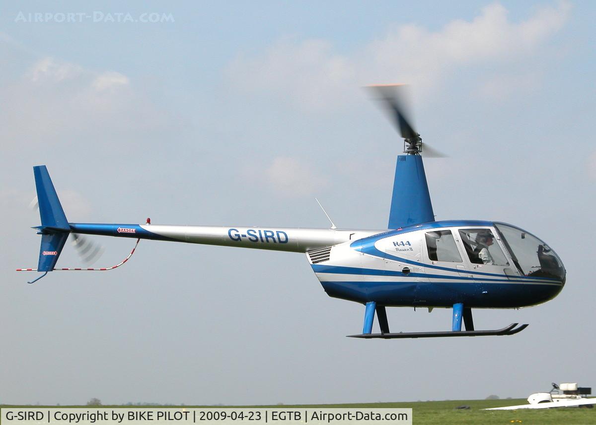 G-SIRD, 2007 Robinson R44 Raven II C/N 11745, FLYING PAST THE RESTAURANT