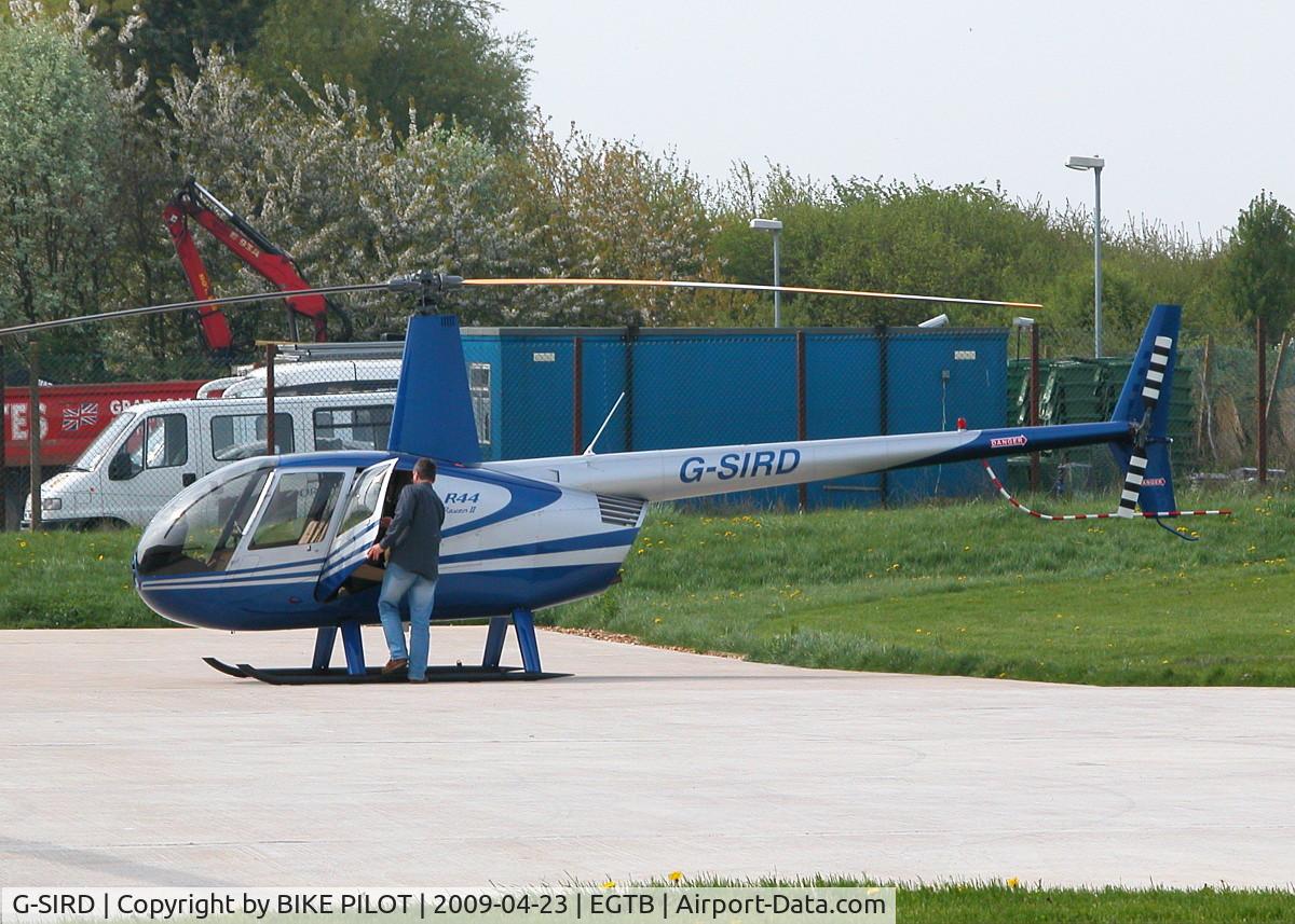 G-SIRD, 2007 Robinson R44 Raven II C/N 11745, ROMEO DELTA ON THE HELI AIR APRON