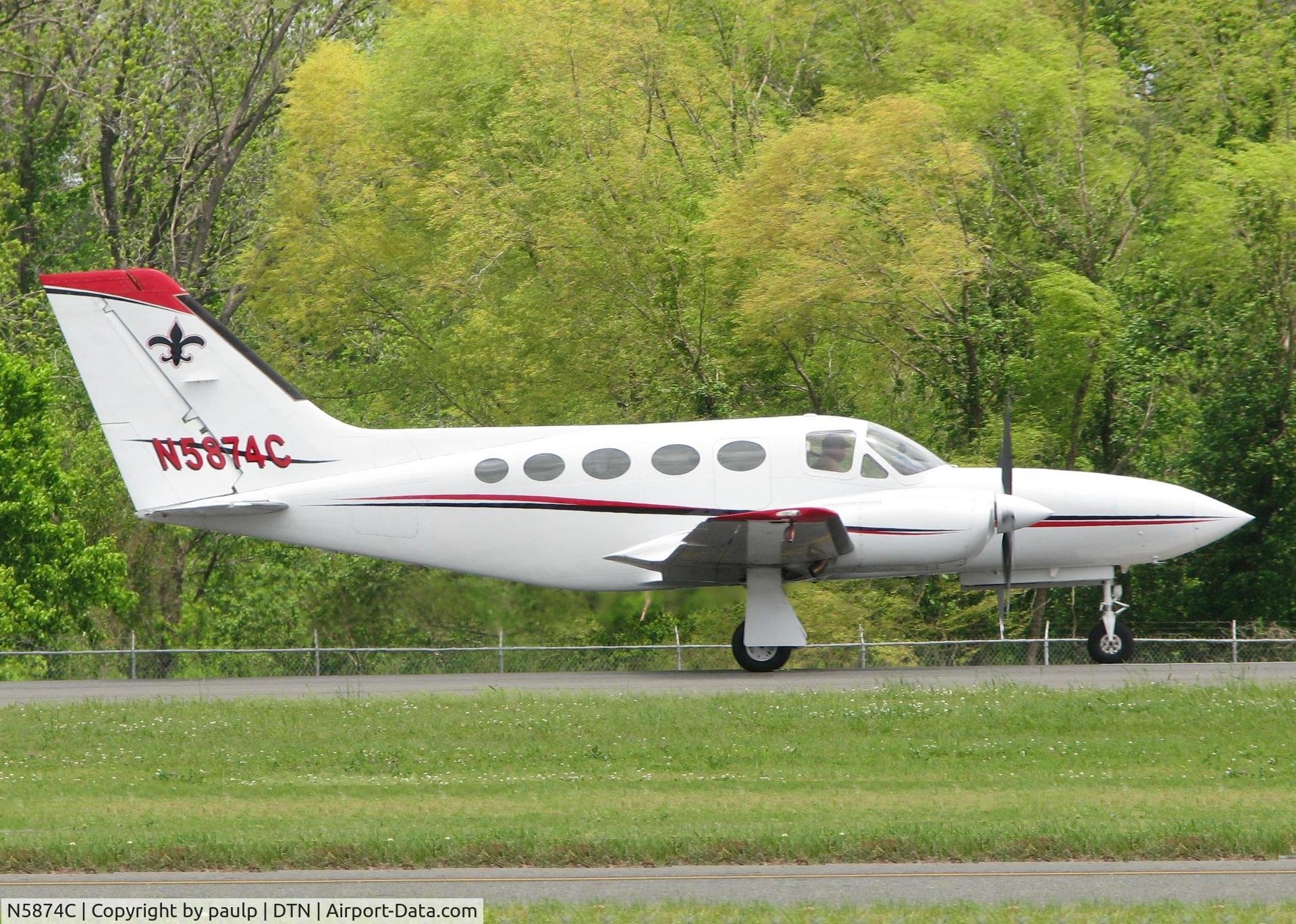N5874C, Cessna 421C Golden Eagle C/N 421C0882, Starting to roll for take off on runway 14 at the Shreveport Downtown airport.
