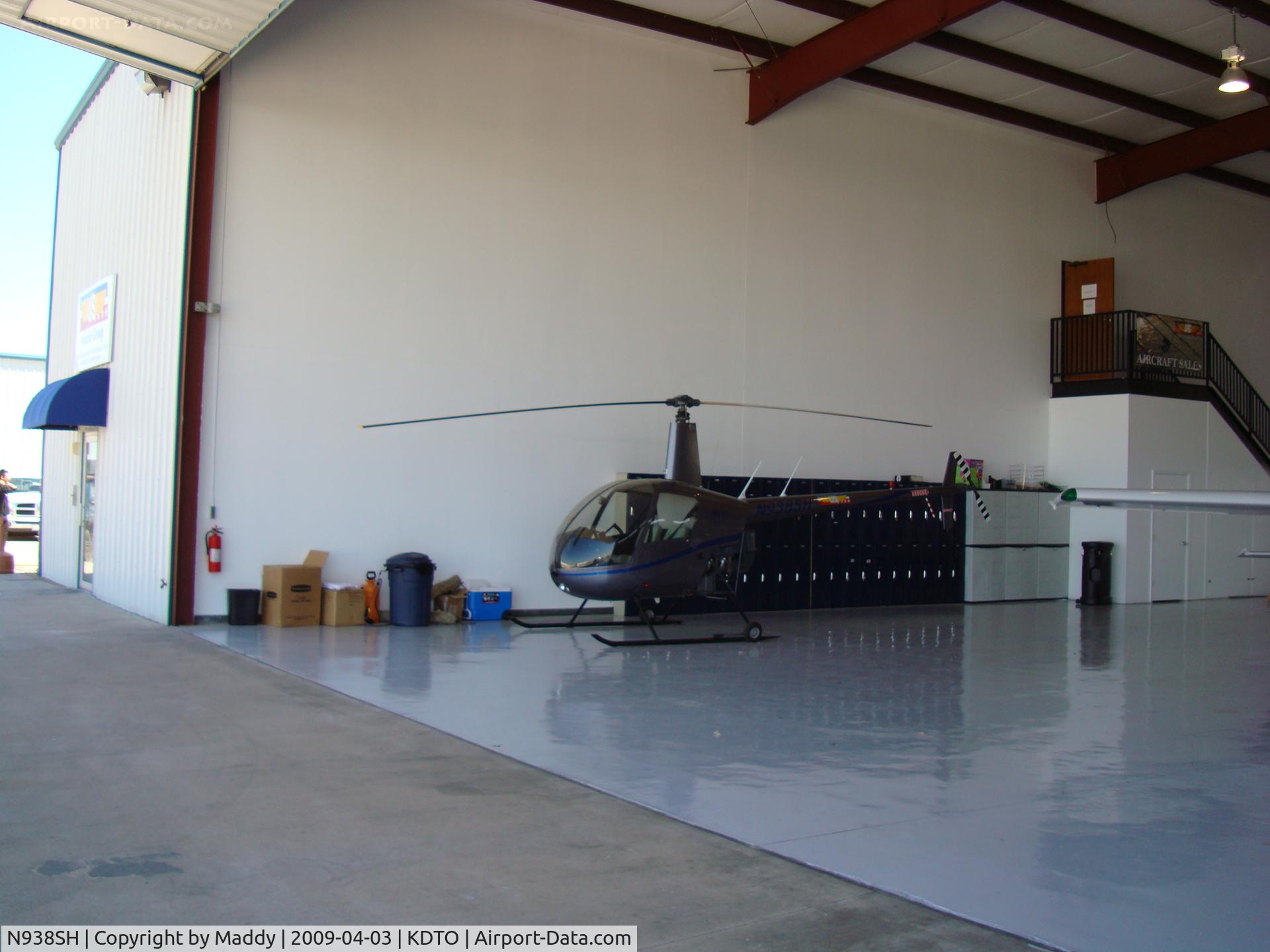 N938SH, 2005 Robinson R22 BETA C/N 3915, parked in flight academy hanger