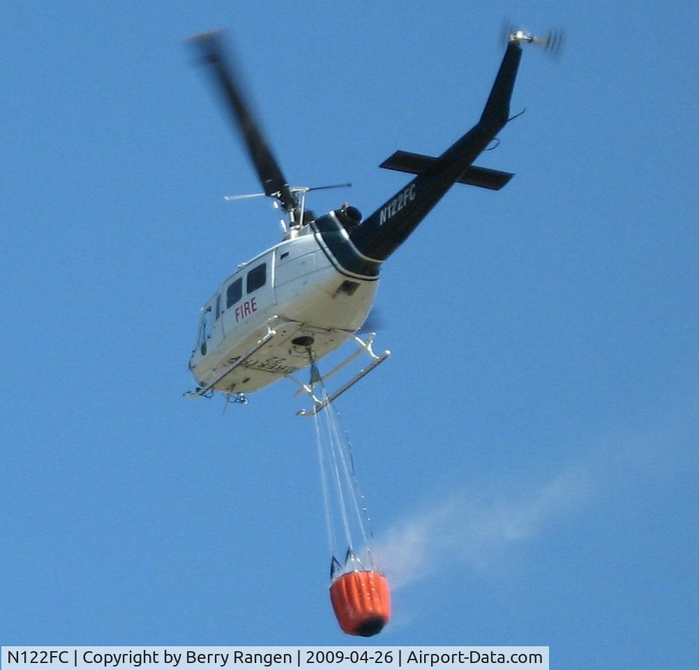 N122FC, Bell UH-1H Iroquois C/N 4749, Caught in flight over Ocala, Florida