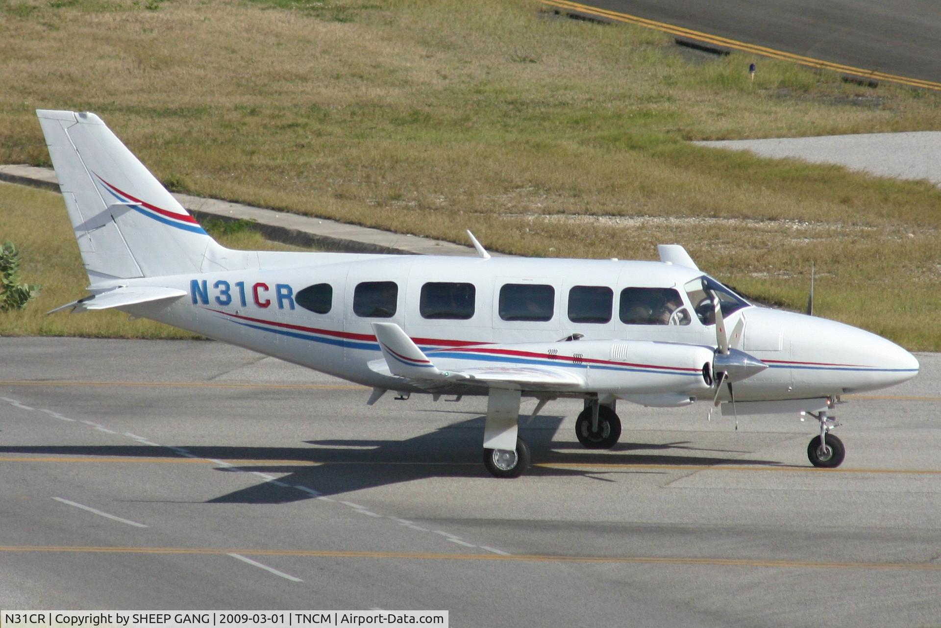 N31CR, Piper PA-31-350 Chieftain C/N 31-8152011, park at the cargo ramp