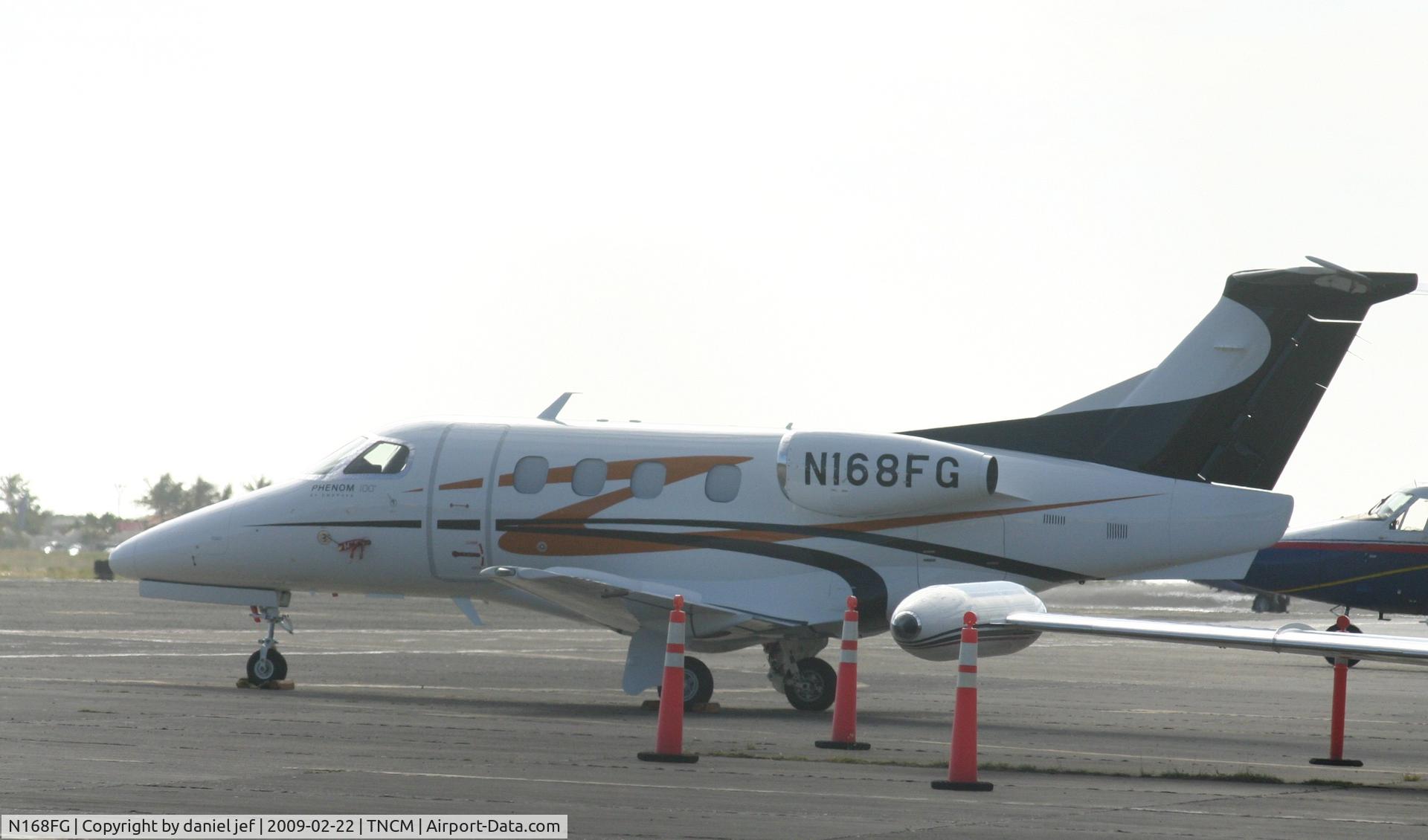 N168FG, 2009 Embraer EMB-500 Phenom 100 C/N 50000012, park at the  tncm ramp