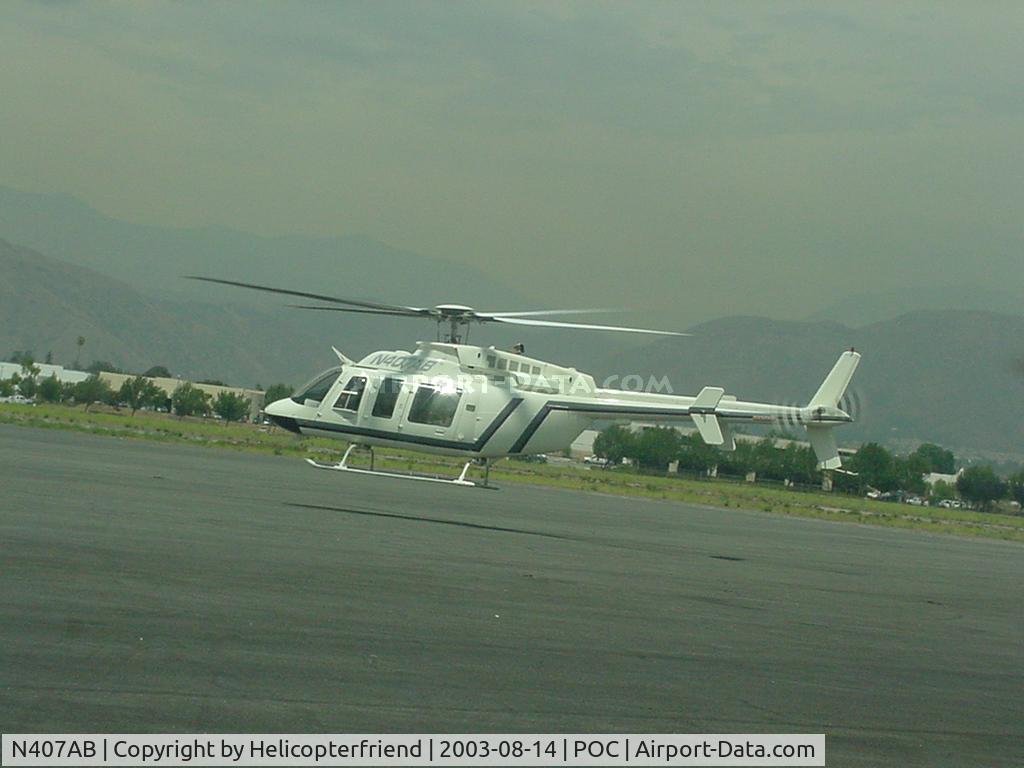 N407AB, 2005 Bell 407 C/N 53634, Taking off from the eastside