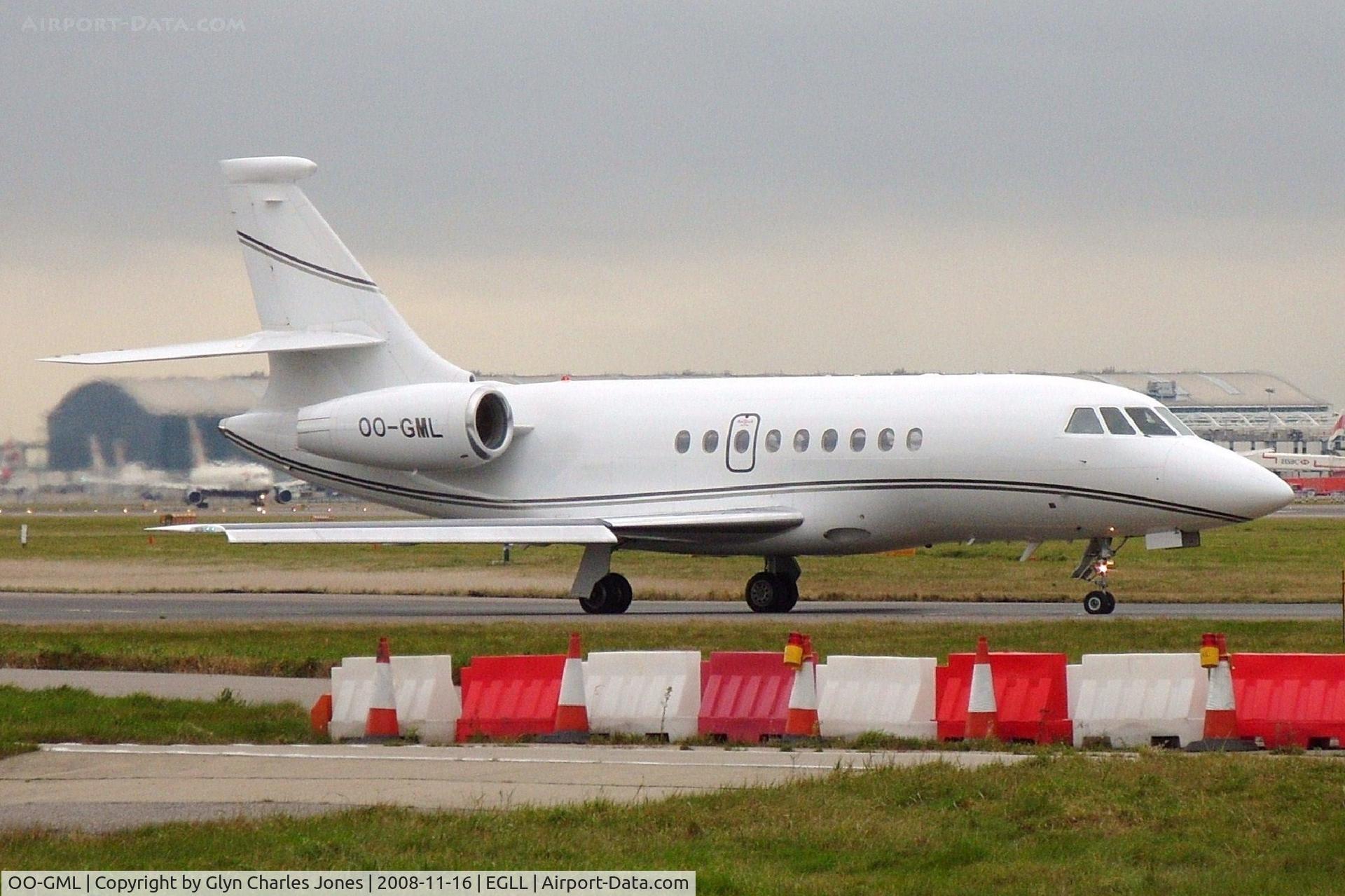 OO-GML, 2005 Dassault Falcon 2000EX C/N 75, Awaiting clearance to line up and take off on runway 27L. Previously F-GUPH and test registration F-WWGL. Owned by Abelag Aviation.