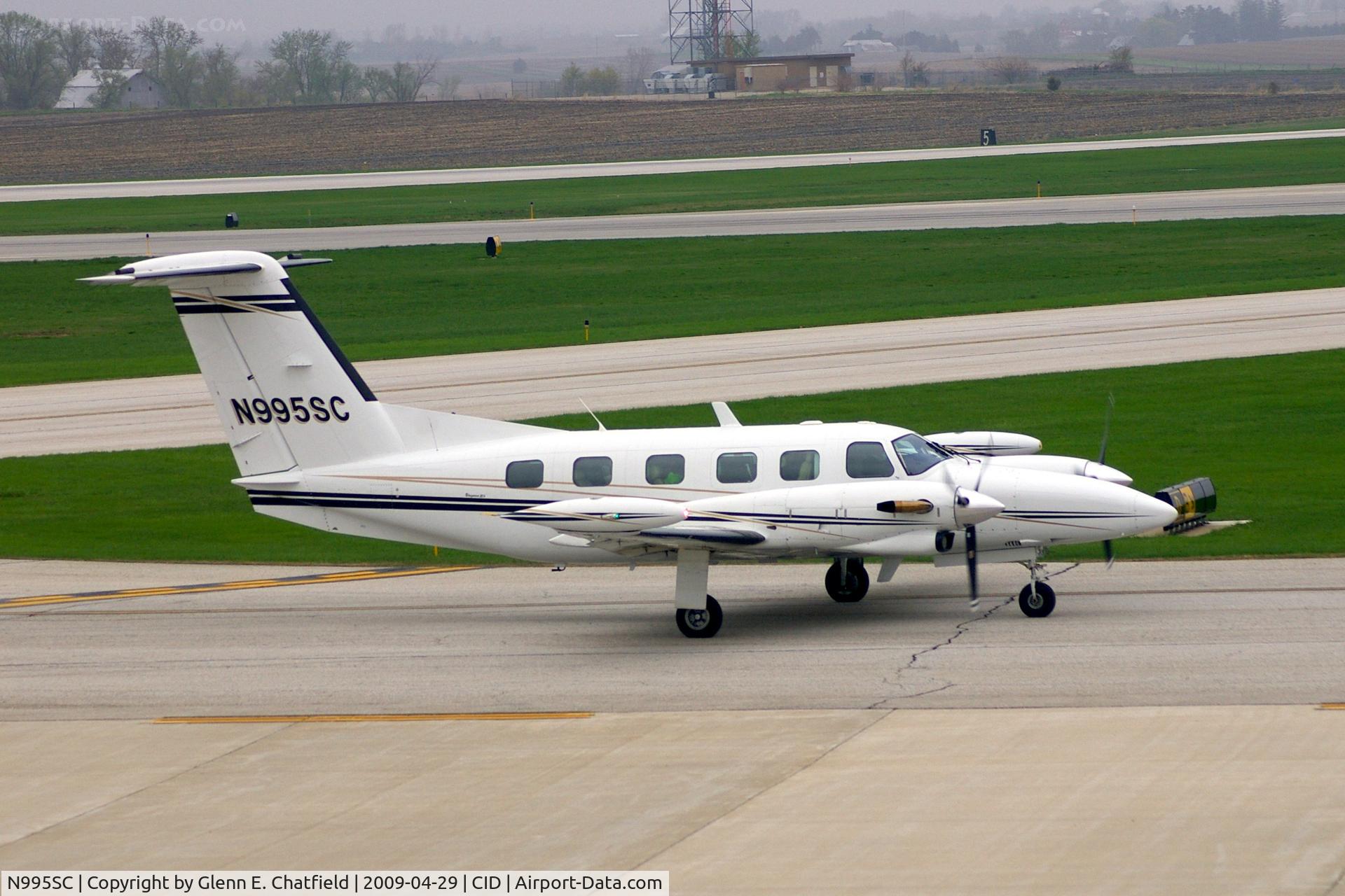 N995SC, 1983 Piper PA-42-720 Cheyenne III C/N 42-5501004, Taxiing past the tower to Landmark FBO.