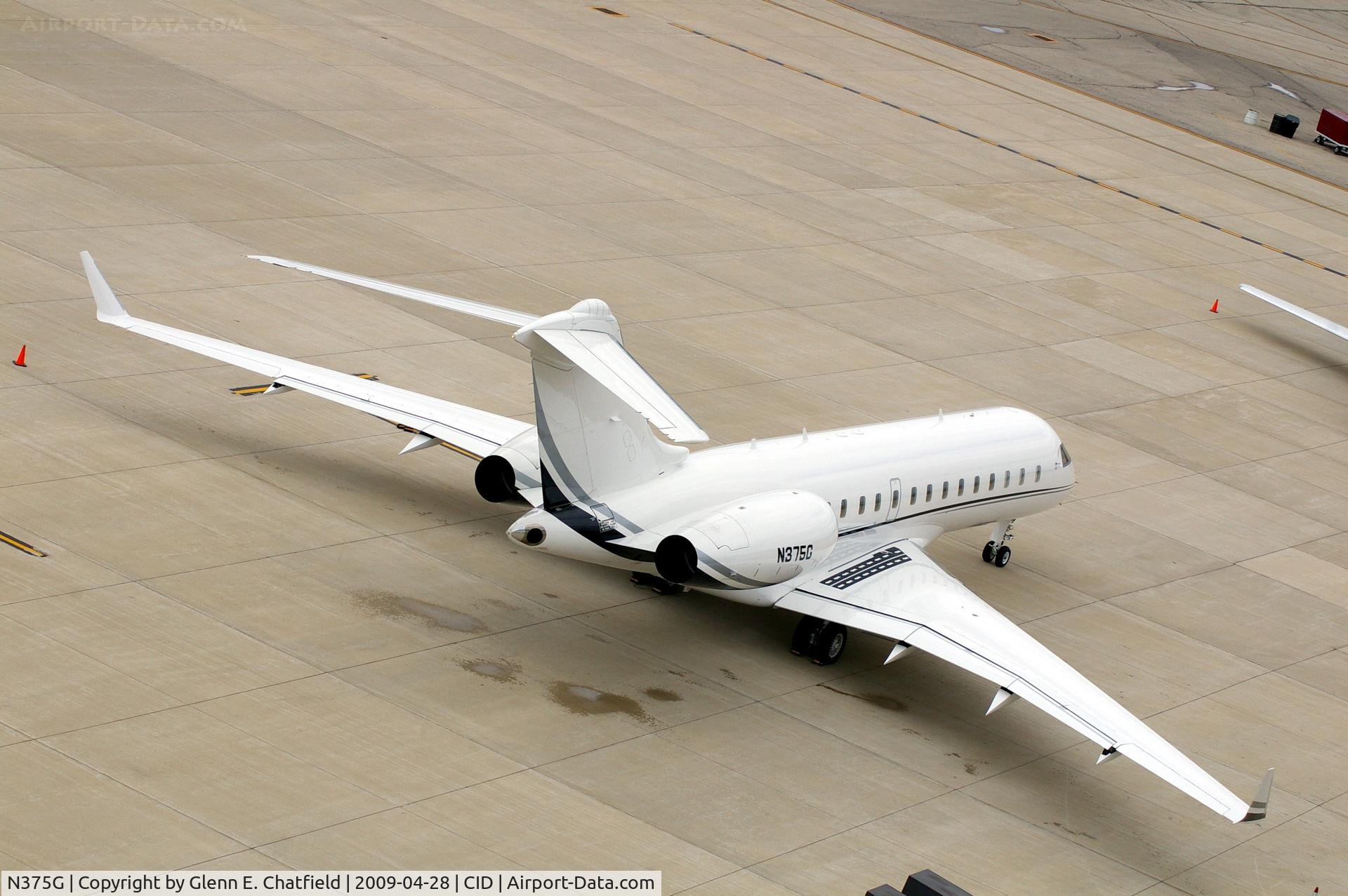N375G, 2007 Bombardier BD-700-1A10 Global Express C/N 9242, Parked at the base of the tower on the Landmark ramp, sideways shot to get wingtip to wingtip