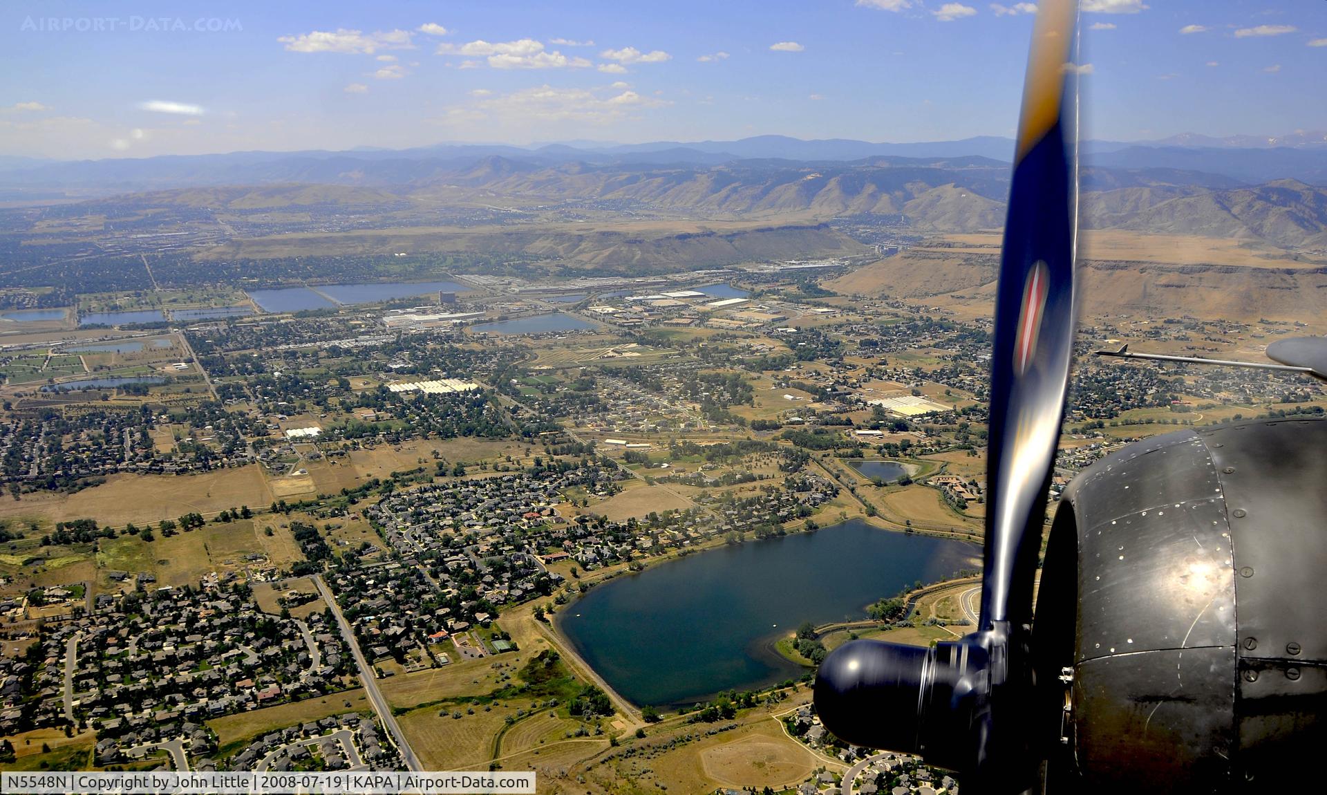 N5548N, 1943 North American B-25H Mitchell C/N 98-21107, East bound back towards the city of Denver