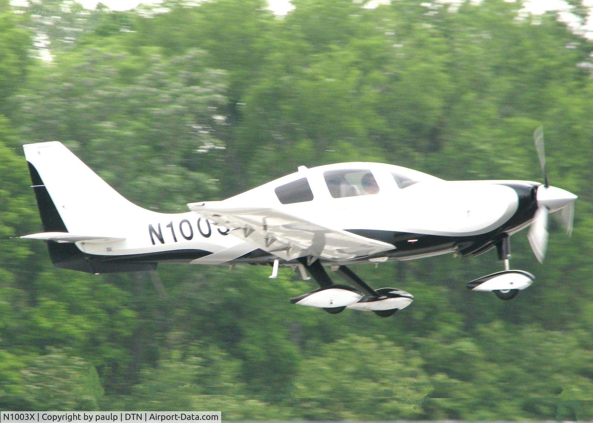 N1003X, 2007 Columbia Aircraft Mfg LC41-550FG C/N 41748, Touching down on 14 at Downtown Shreveport.