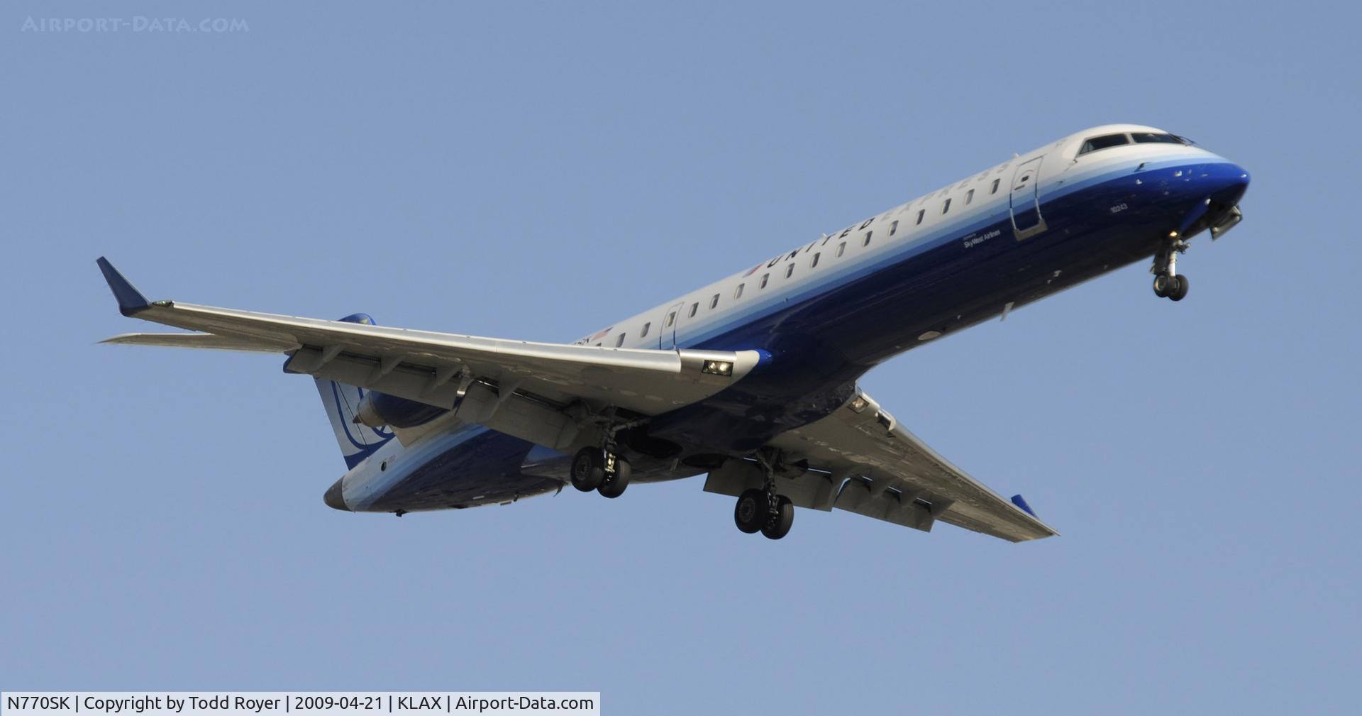 N770SK, 2006 Canadair CL-600-2C10 Regional Jet CRJ-700 C/N 10243, Landing 24R at LAX