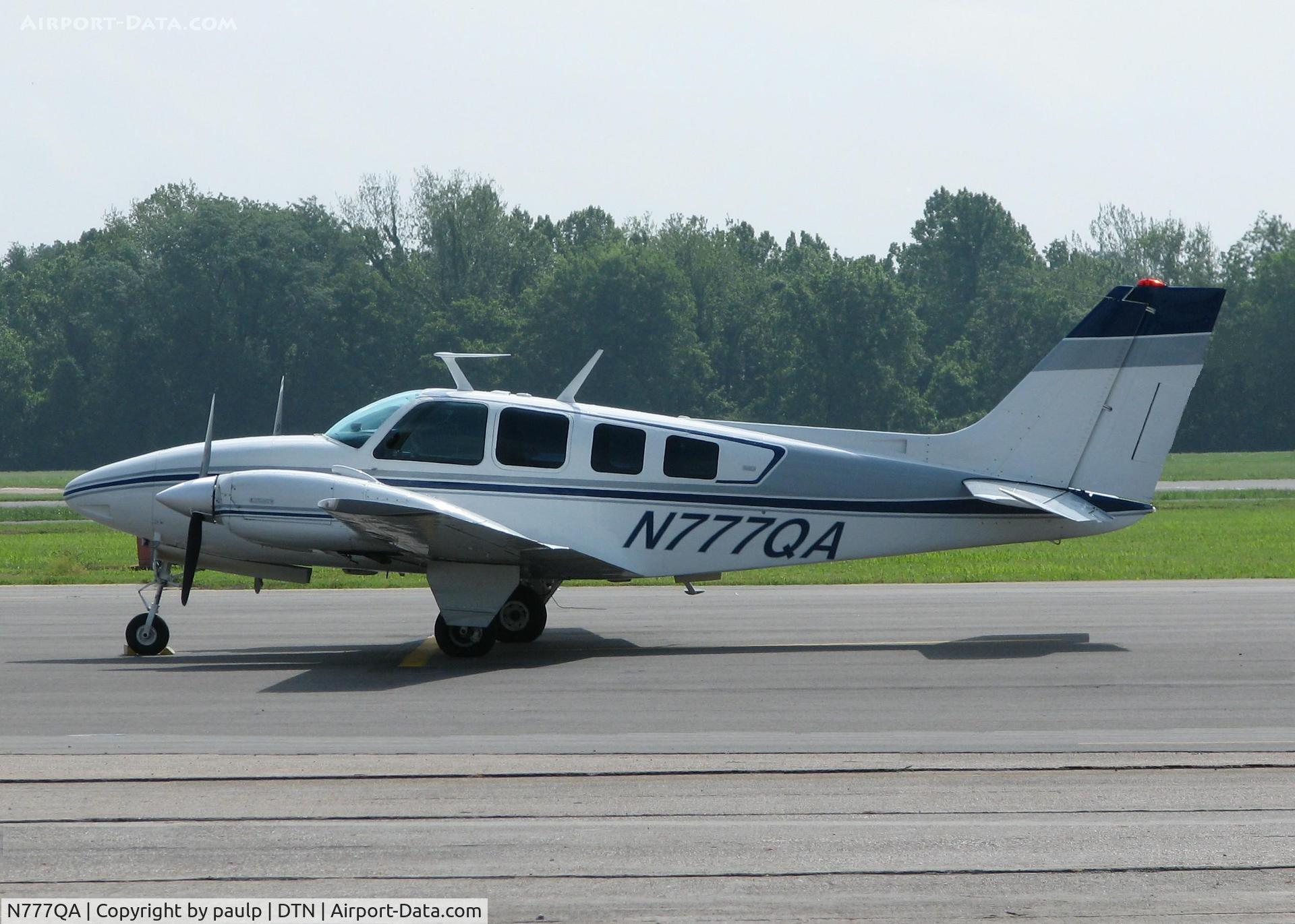 N777QA, 1970 Beech 58 Baron C/N TH-143, parked at Downtown Shreveport.