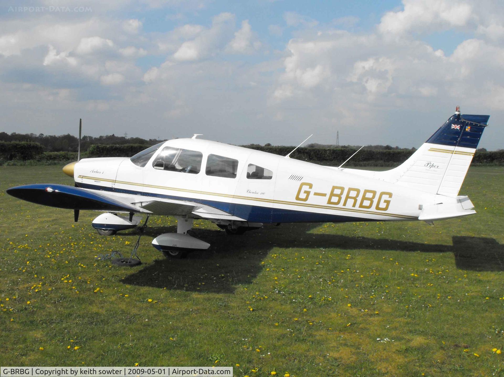 G-BRBG, 1975 Piper PA-28-180 Cherokee Archer C/N 28-7505248, Parked outside at the East Winch Strip