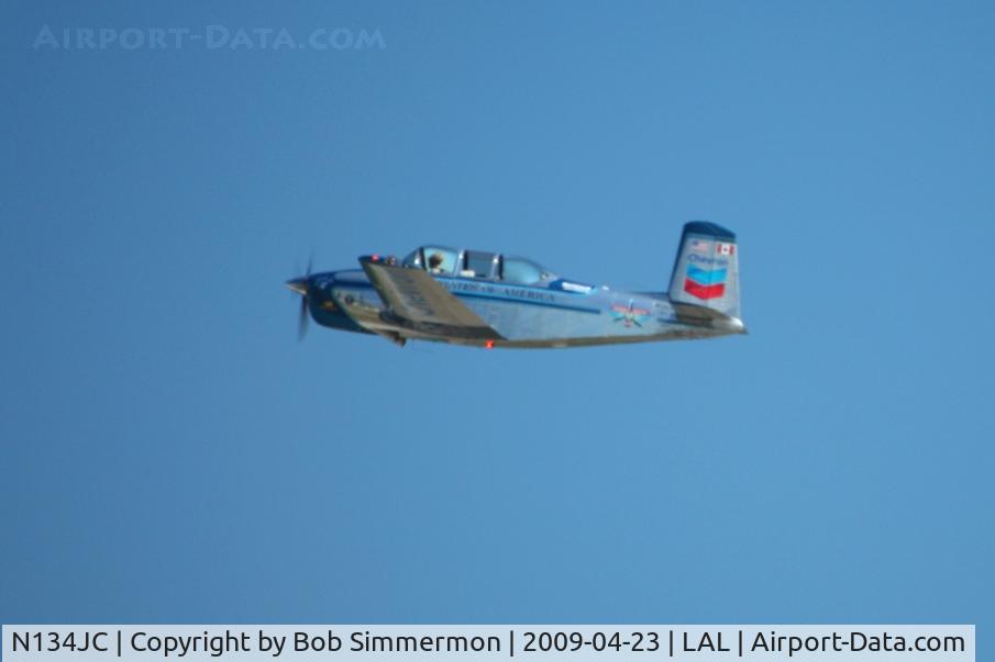N134JC, 1955 Beech T-34-A (A45) Mentor C/N G-812, Aerobatic star Julie Clarke departing Sun N Fun 2009 - Lakeland, Florida