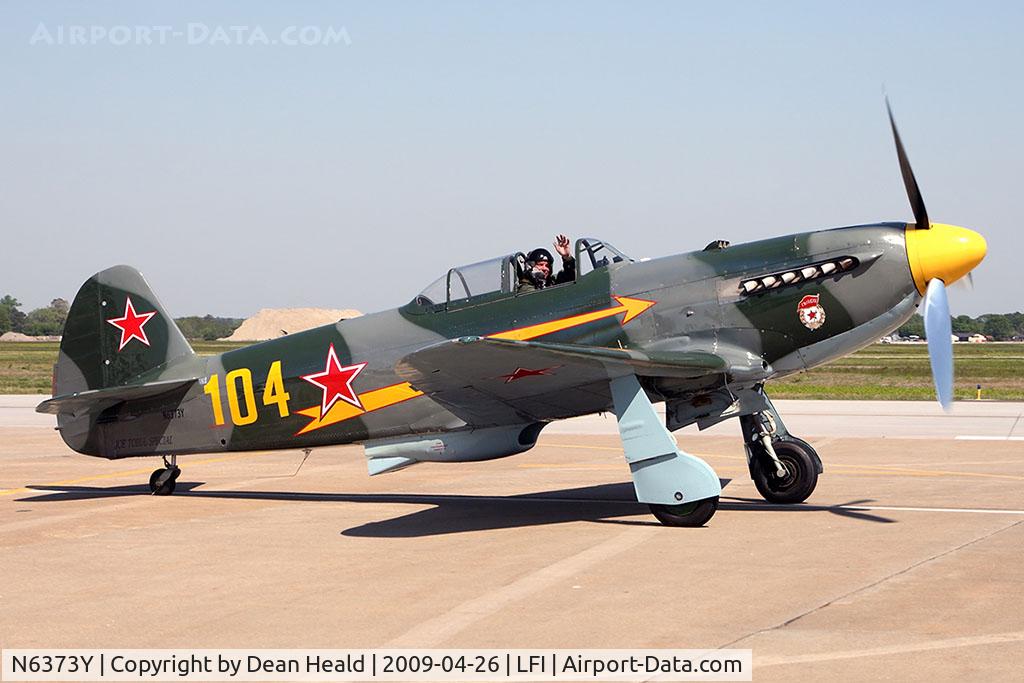 N6373Y, 1997 Yakovlev Yak-9U-M C/N 0470404, Sean Carroll in his YAK-9 taxiing in front of the crowd after his performance on Sunday.