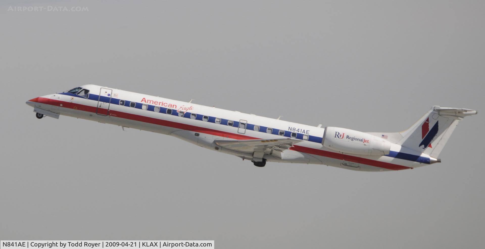 N841AE, 2002 Embraer ERJ-140LR (EMB-135KL) C/N 145667, Departing LAX on 25R