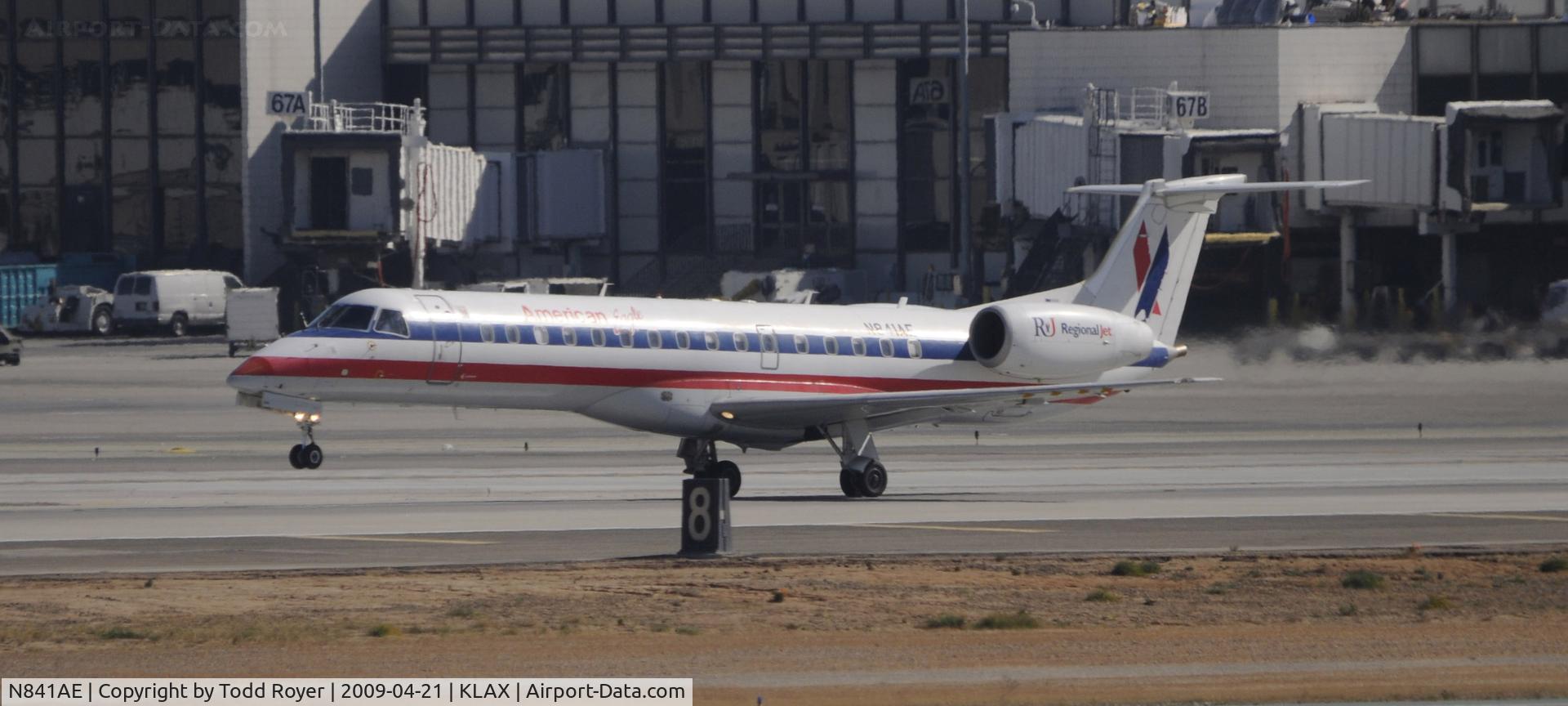 N841AE, 2002 Embraer ERJ-140LR (EMB-135KL) C/N 145667, Departing LAX on 25R