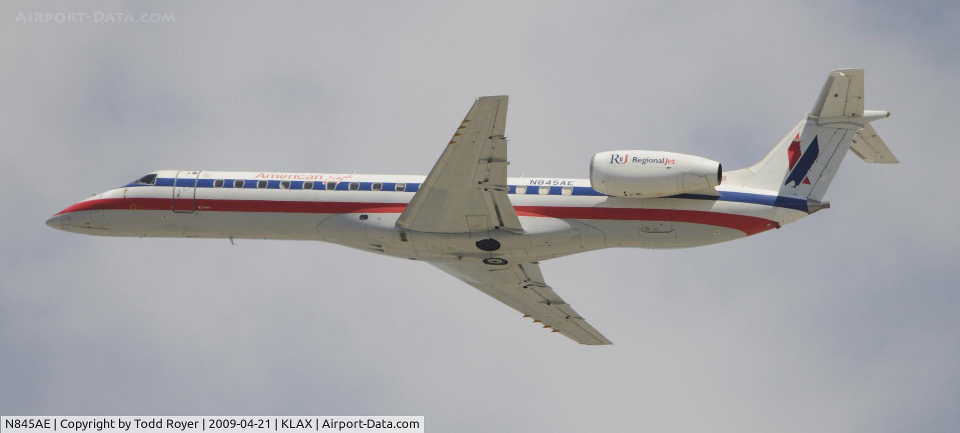 N845AE, 2003 Embraer ERJ-140LR (EMB-135KL) C/N 145685, Departing LAX on 25R