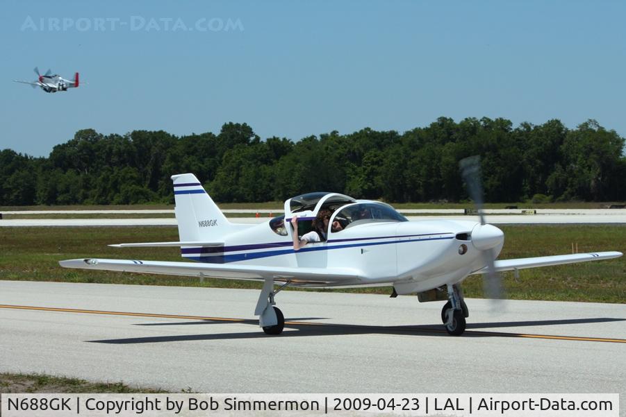 N688GK, 2006 Glasair Super II RG C/N 2291, N10601 in the background at Sun N Fun 2009 - Lakeland, Florida