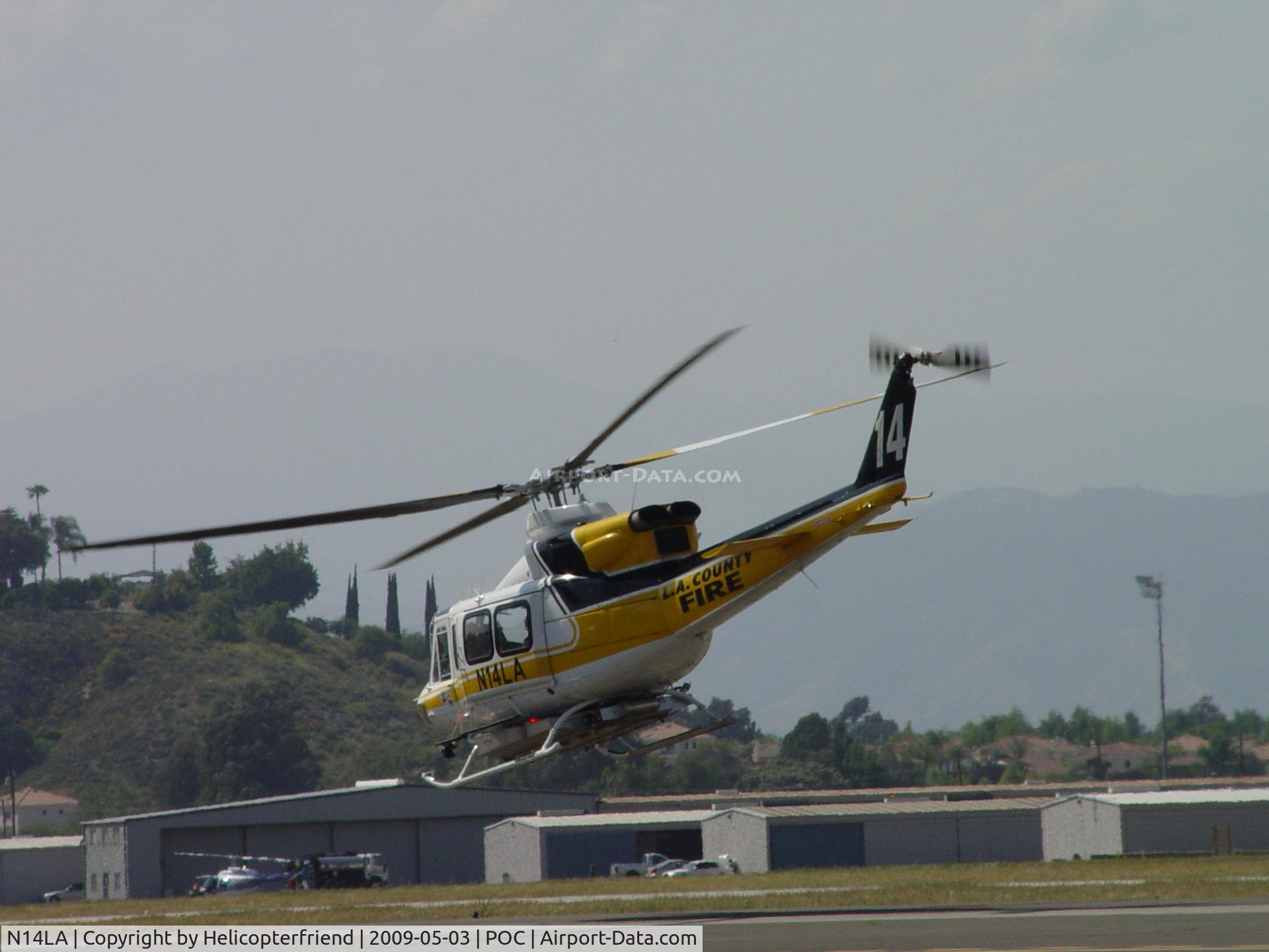 N14LA, 2005 Bell 412EP C/N 36393, Departing westbound