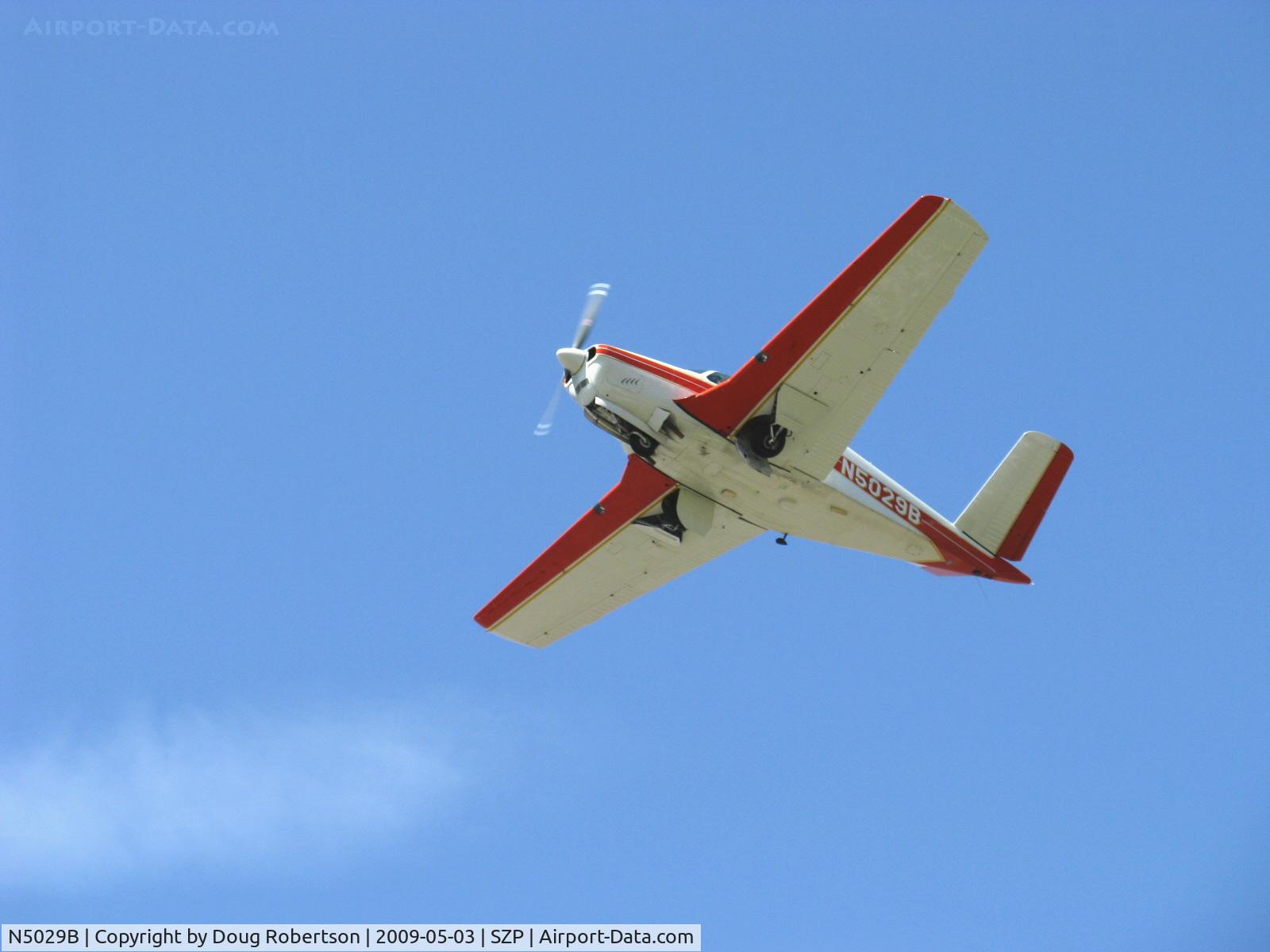N5029B, 1955 Beech F35 Bonanza C/N D-4296, 1955 Beech F35 BONANZA, Continental E-225-8 225 Hp, takeoff climb Rwy 22, gear coming up