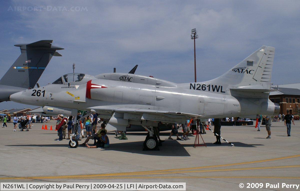 N261WL, 1974 Douglas A-4N Skyhawk C/N 14453, Sweet to find a scooter on the ramp, and note the Israeli tailpipe