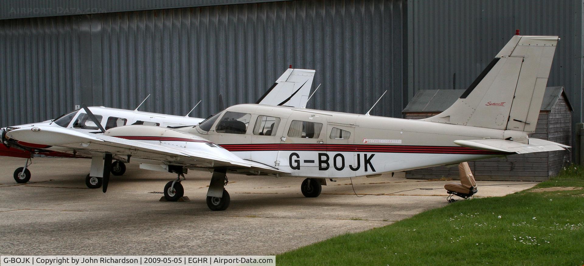 G-BOJK, 1986 Piper PA-34-220T Seneca III C/N 34-33020, At Goodwood