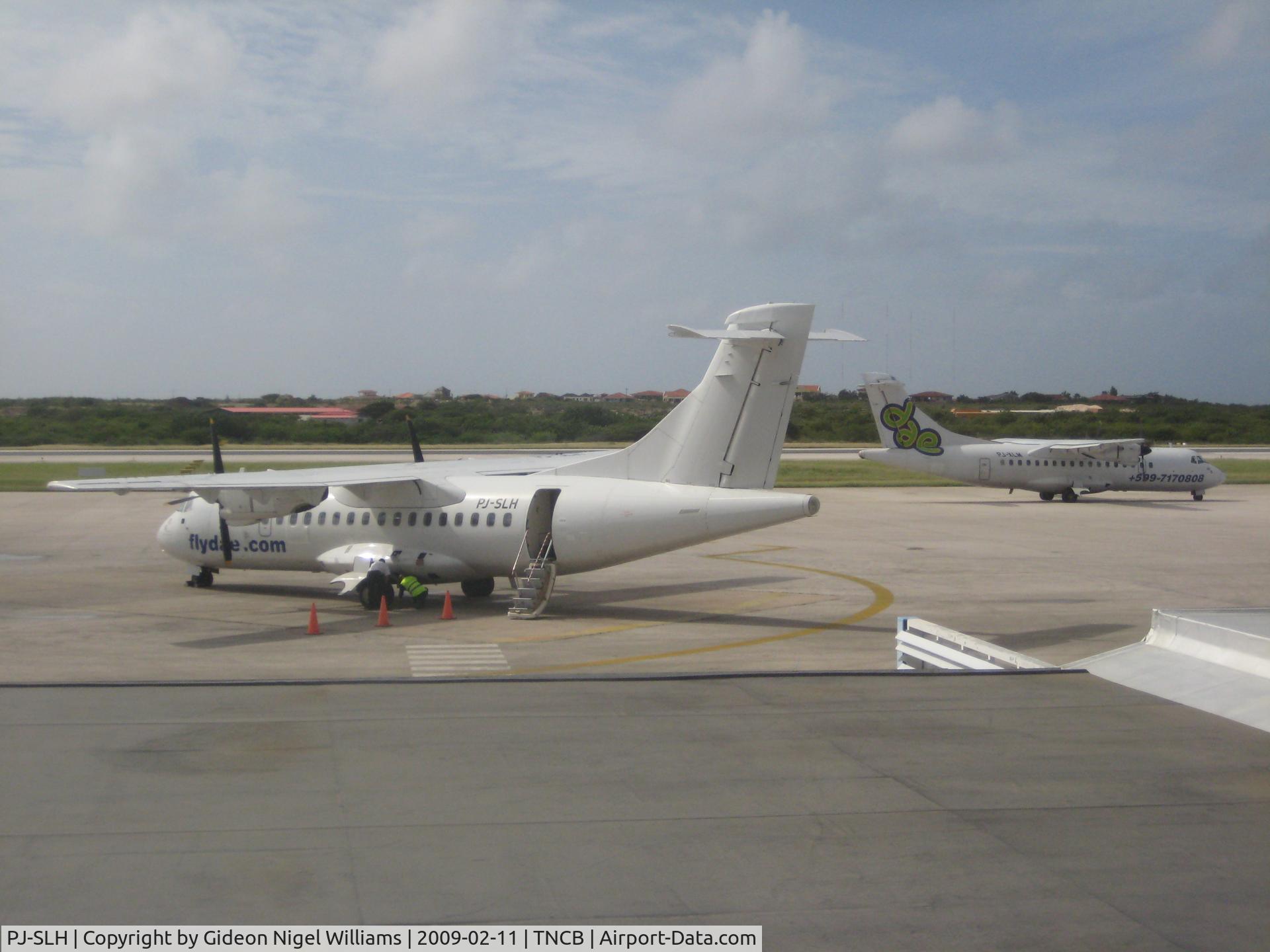 PJ-SLH, 1988 ATR 42-320 C/N 090, The white one with sister in the back ground