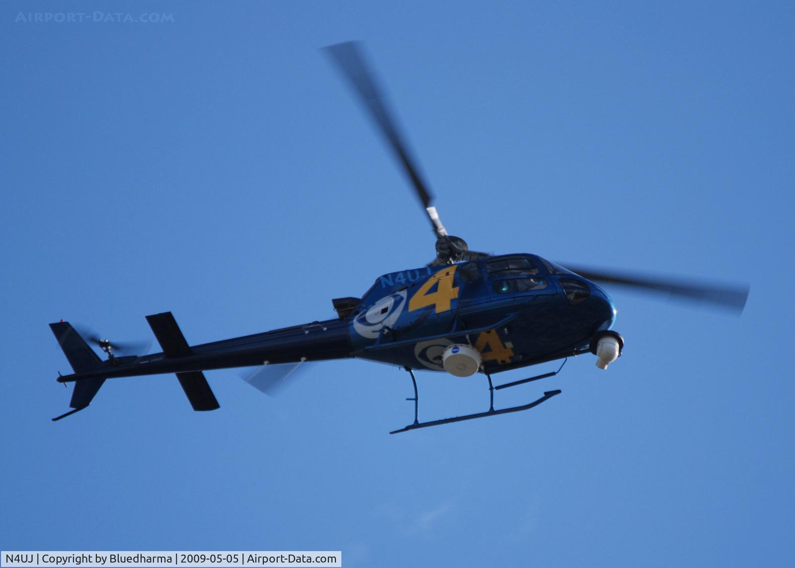 N4UJ, 2003 Eurocopter AS-350B-3 Ecureuil Ecureuil C/N 3731, Flying over Columbine High School heading West.